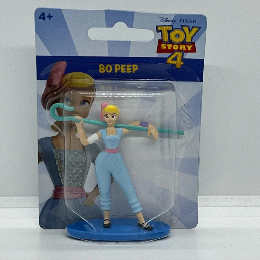 Toy Story 4 play characters or Birthday Cake toppers Disney